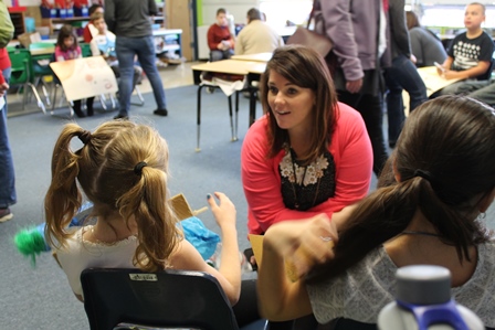 Amy Minor, Superintendent, with students