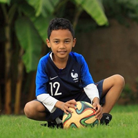 Child with soccer ball